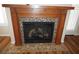 Charming fireplace with a wooden mantel and stone accents, creating a focal point in the living space at , Las Vegas, NV 89130