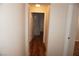 Hallway with wood floors leading to various rooms at , Las Vegas, NV 89130