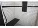 Close up of a walk-in tiled shower with built-in seat and shower niche at , Las Vegas, NV 89130