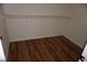 Spacious walk-in closet with hardwood floors and ample shelving for organization at , Las Vegas, NV 89130