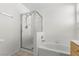 Well-lit bathroom featuring shower and bath at 1132 Coral Desert Dr, Las Vegas, NV 89123