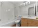 Bright bathroom with a vanity and bathtub at 1132 Coral Desert Dr, Las Vegas, NV 89123