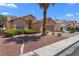 Charming single-story home featuring a well-maintained yard and desert landscaping at 1132 Coral Desert Dr, Las Vegas, NV 89123