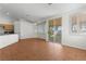 Bright living space with natural light, featuring tile floors and sliding doors leading to the outdoors at 1132 Coral Desert Dr, Las Vegas, NV 89123