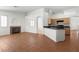 Open-concept living space, combining the kitchen, dining area, and living room at 1132 Coral Desert Dr, Las Vegas, NV 89123