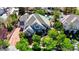 Beautiful aerial view of a home featuring a pool and lush landscaping on a sunny day at 1266 Imperia Dr, Henderson, NV 89052
