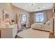 Cozy bedroom with a white bed and dresser and a window with a view at 1266 Imperia Dr, Henderson, NV 89052