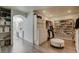 Large closet with custom shelves and drawers, and an adjoining bathroom at 1266 Imperia Dr, Henderson, NV 89052