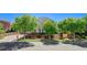Charming home with a well-manicured front yard and mature trees at 1266 Imperia Dr, Henderson, NV 89052