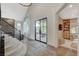 Grand foyer featuring high ceilings, statement staircase, and modern design at 1266 Imperia Dr, Henderson, NV 89052