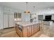 Well-lit kitchen boasting a large island, modern appliances, and open layout at 1266 Imperia Dr, Henderson, NV 89052