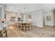 Open kitchen featuring an island with seating, modern appliances, and ample storage at 1266 Imperia Dr, Henderson, NV 89052