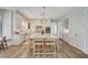 Elegant kitchen with large island, bar stool seating, and modern cabinetry at 1266 Imperia Dr, Henderson, NV 89052