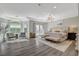 Spacious main bedroom with high ceilings, large windows, and a seating area, creating a luxurious and relaxing retreat at 1266 Imperia Dr, Henderson, NV 89052