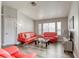 Inviting living room featuring contemporary furnishings, neutral walls, and attractive flooring at 1320 Rainbow Meadows Dr, Las Vegas, NV 89128