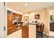 Well-equipped kitchenette with modern appliances and breakfast bar at 145 E Harmon Ave # 1001, Las Vegas, NV 89109