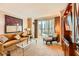 Cozy living room with comfortable sofa and views of the city at 145 E Harmon Ave # 1001, Las Vegas, NV 89109