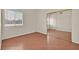 This bedroom offers wood floors and a mirrored closet at 1517 Kirby Dr, Las Vegas, NV 89117