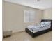 Cozy bedroom showcasing a bed and a window providing natural light, creating a comfortable and private space at 1517 Kirby Dr, Las Vegas, NV 89117