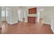 Hallway featuring hardwood floors, access to multiple rooms, and built in cabinets providing ample storage space at 1517 Kirby Dr, Las Vegas, NV 89117