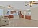 Bright and airy kitchen with tile floors, stainless steel appliances, and a cozy seating area at 1517 Kirby Dr, Las Vegas, NV 89117