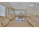 Bright living room with tile flooring, bay window, and elegant, ornate furnishings at 1517 Kirby Dr, Las Vegas, NV 89117