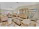 Spacious living area with tile flooring, ornate furnishings, and lots of natural light at 1517 Kirby Dr, Las Vegas, NV 89117