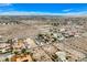 Broad aerial shot of a desert community showcasing the vastness of homesites and desert landscape at 156 N Parawan St, Henderson, NV 89015