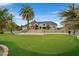 A putting green and pool are just steps away in this picturesque backyard at 156 N Parawan St, Henderson, NV 89015