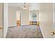 This bedroom offers lots of space and an adjacent bathroom and an office nook under the window at 156 N Parawan St, Henderson, NV 89015