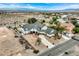 Stunning two-story home showcasing a grand entrance and well-manicured front yard with a spacious driveway and desert landscaping at 156 N Parawan St, Henderson, NV 89015