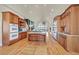 Large kitchen with island, stainless steel appliances, and wood cabinetry at 156 N Parawan St, Henderson, NV 89015