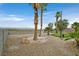 Spacious backyard with rock landscaping and a putting green for outdoor enjoyment at 156 N Parawan St, Henderson, NV 89015