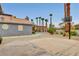 View of desert landscaping, basketball court, and tall palm trees at 1970 Del Font Ct, Las Vegas, NV 89117