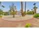 Backyard with desert landscaping and a partial view of the pool at 1970 Del Font Ct, Las Vegas, NV 89117