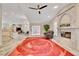 Open living room with decorative fireplace and plush seating at 1970 Del Font Ct, Las Vegas, NV 89117