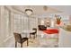 Cozy breakfast nook adjacent to open living room with decorative fireplace at 1970 Del Font Ct, Las Vegas, NV 89117