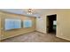 Bedroom featuring carpet, neutral tones, window and natural light at 2000 Gravel Hill St # 203, Las Vegas, NV 89117