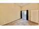 Bedroom featuring neutral carpet and walls with door to a balcony at 2000 Gravel Hill St # 203, Las Vegas, NV 89117