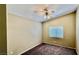 Cozy bedroom features a window, carpet, and neutral walls at 2000 Gravel Hill St # 203, Las Vegas, NV 89117