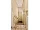 Staircase leads to upper level, tile and carpet at 2000 Gravel Hill St # 203, Las Vegas, NV 89117