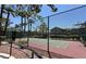View of a fenced tennis court in a residential community at 2000 Gravel Hill St # 203, Las Vegas, NV 89117