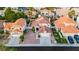 Beautiful home with well maintained landscaping, a driveway, a red tile roof, and lush surrounding neighborhood at 2107 Fountain Springs Dr, Henderson, NV 89074
