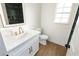 Elegant bathroom featuring a modern vanity with gold fixtures and a sleek, tiled shower at 2107 Fountain Springs Dr, Henderson, NV 89074