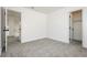 Carpeted bedroom featuring an exit door to second floor hallway and closet at 2107 Fountain Springs Dr, Henderson, NV 89074