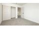 Bedroom with carpeting, closet, and entranceway to upper floor at 2107 Fountain Springs Dr, Henderson, NV 89074