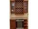 Entertain with a wine fridge and custom shelving, perfect for storage and style at 2208 Fiero Dr, Las Vegas, NV 89134