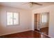 Bedroom with a mirror closet and a window at 2208 Fiero Dr, Las Vegas, NV 89134