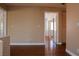 Bedroom featuring hardwood floors and neutral walls and a doorway to another room at 2208 Fiero Dr, Las Vegas, NV 89134