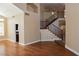 Bright foyer featuring an elegant staircase with wrought iron details at 2208 Fiero Dr, Las Vegas, NV 89134
